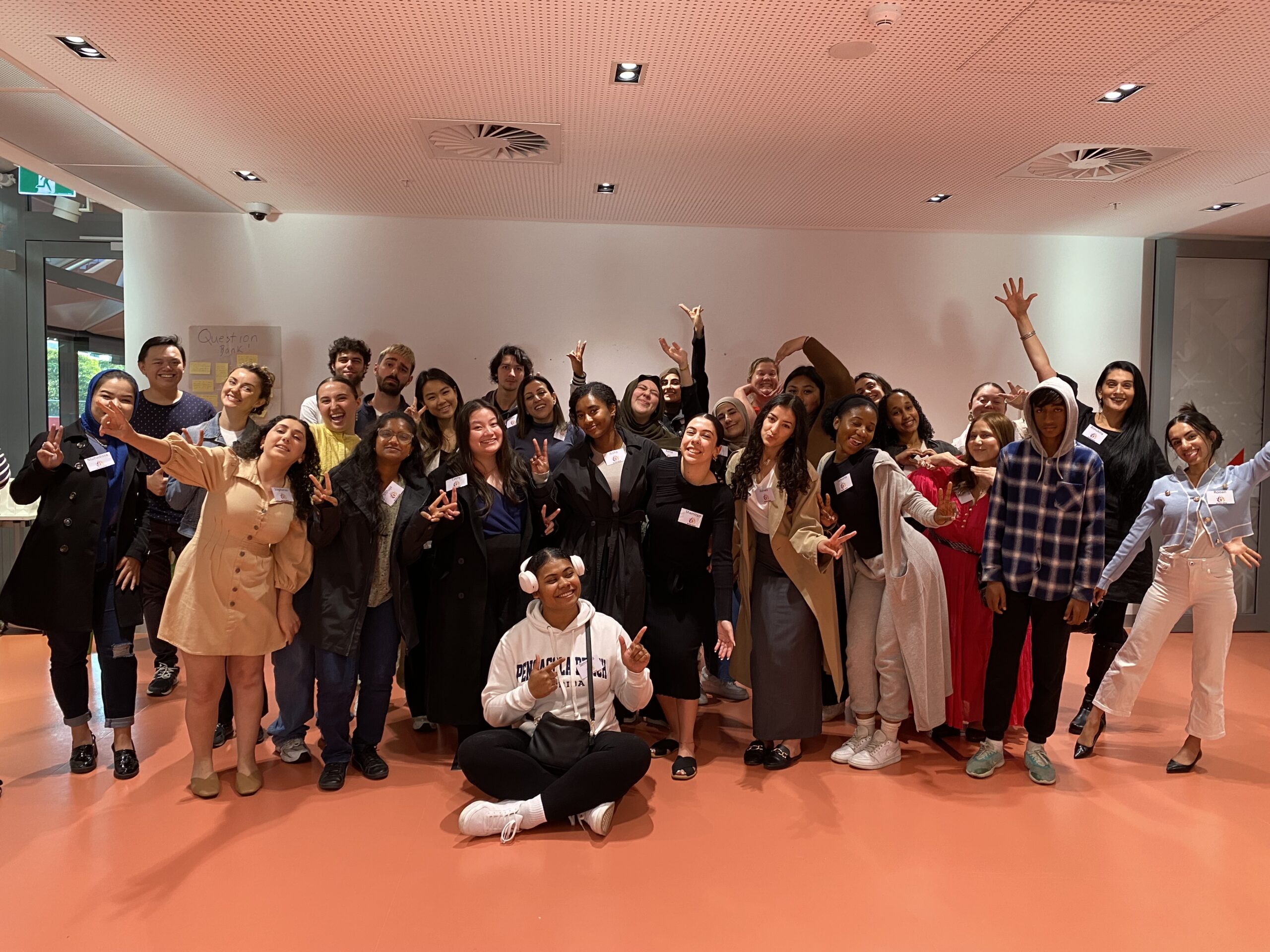 a group of multicultural young people smiling